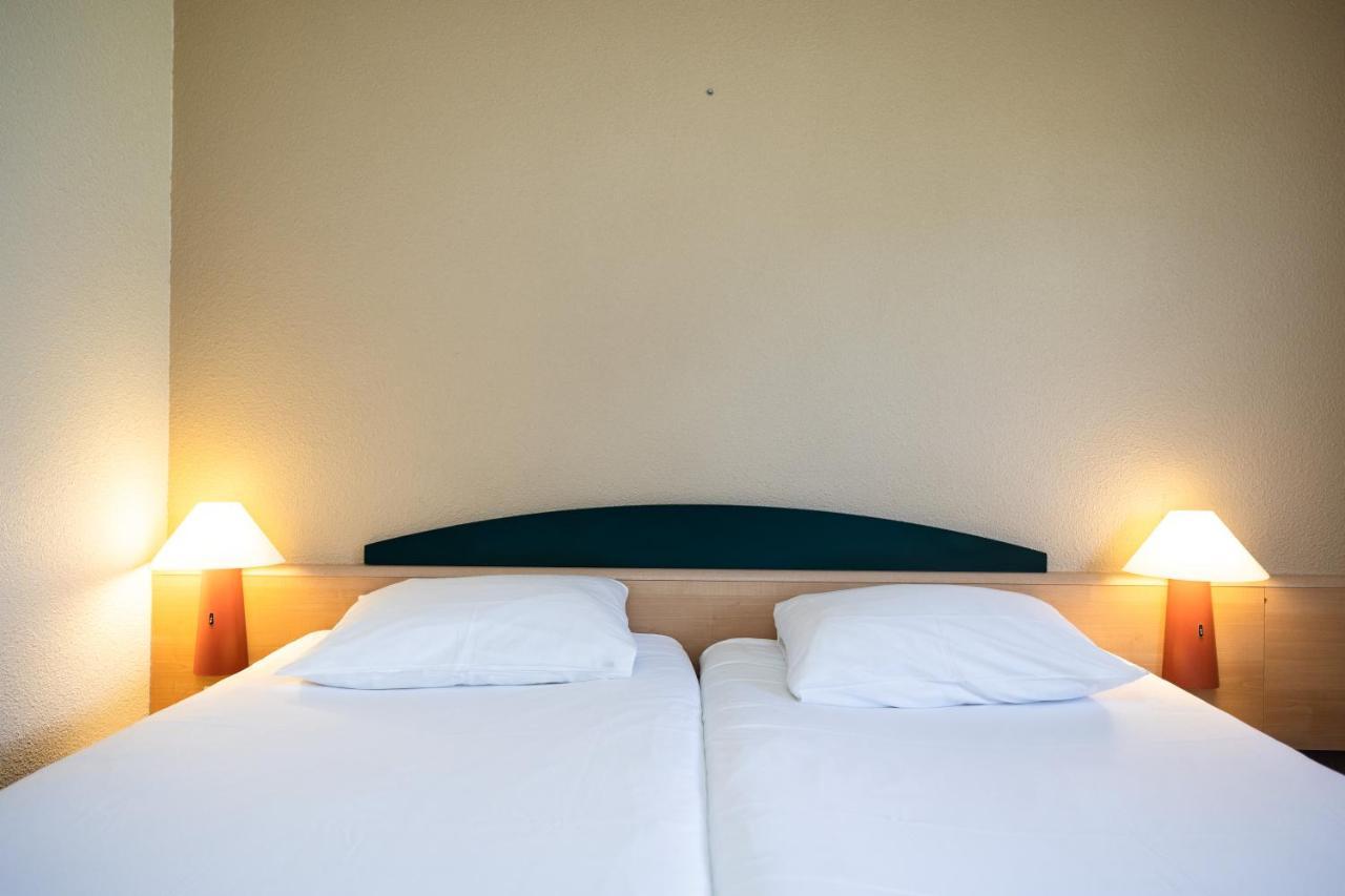 Hotel Ibis Autun Bagian luar foto